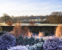 View of parkland and lake from the Italianate garden at Borde Hill in winter