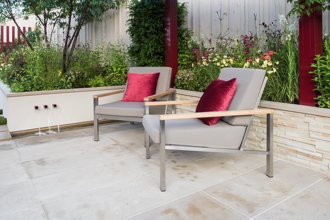 Contemporary patio with raised beds, rill and water shoots