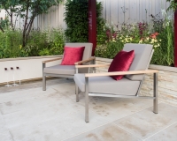 Contemporary patio with raised beds, rill and water shoots