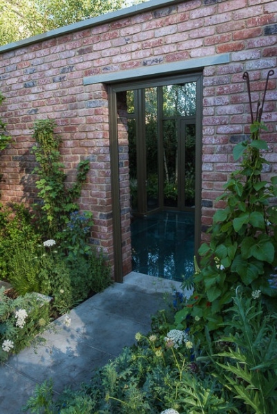Pathway leading up towards the entrance to a lean to conservatory