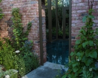 Pathway leading up towards the entrance to a lean to conservatory