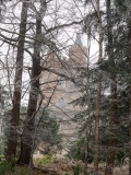The tower seen through trees at Painshill Park landscape garden