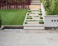 Scented pathway planted with herbs in a small garden